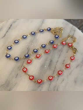 (2) Evil Eye Blue and Red Stainless Steel Bracelets